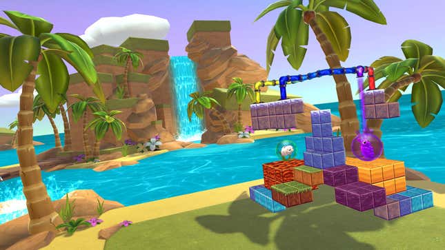 A handful of Water Bears VR blocks are stacked up against a summery, waterfall backdrop.