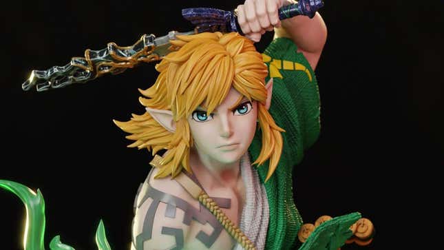Link holds a shattered Master Sword over his head. 